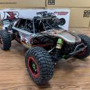Masina cu Telecomanda Profesionala NSR 5XL-E 1:5 Rosie - 4x4 Off Road, Motor Puternic, 80 km/h, Baterie LiPo 7000mAh 4S + Incarcator SKYRC, Complet Echipata Gata de Joaca